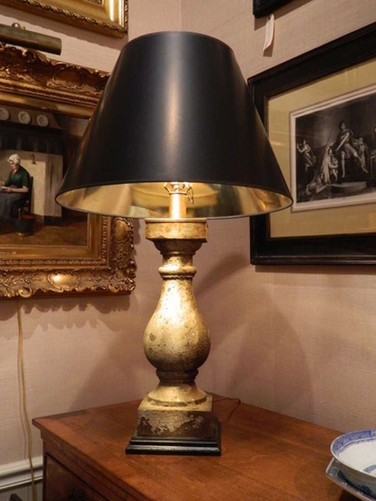 18th century cast iron balustrade adapted as a lamp and fitted with a beeswax sleeve.