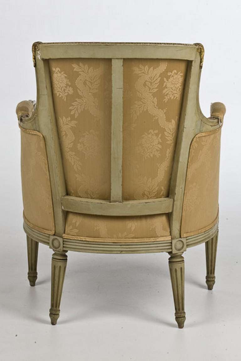 Late 19th Century Louis XVI Style Painted Bergere Chair with Down Cushion and Upholstered in Silk Fabric