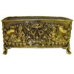 Brass Jardiniere in a Rectangle Shape Ending on Scroll Feet