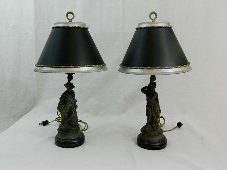 Pair of 19th century pewter figurines adapted as lamps with custom painted shades and hi-lo switches.