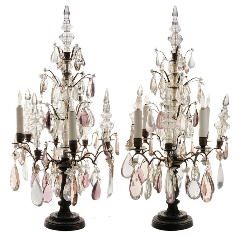 19th Century French Brass and Rock Crystal Four-Light Table Candelabra Girandoles, each with pieced clear crystal blown sections forming center post and supporting four graduated tiers of clear and amethyst rock crystal cut drops and four brass