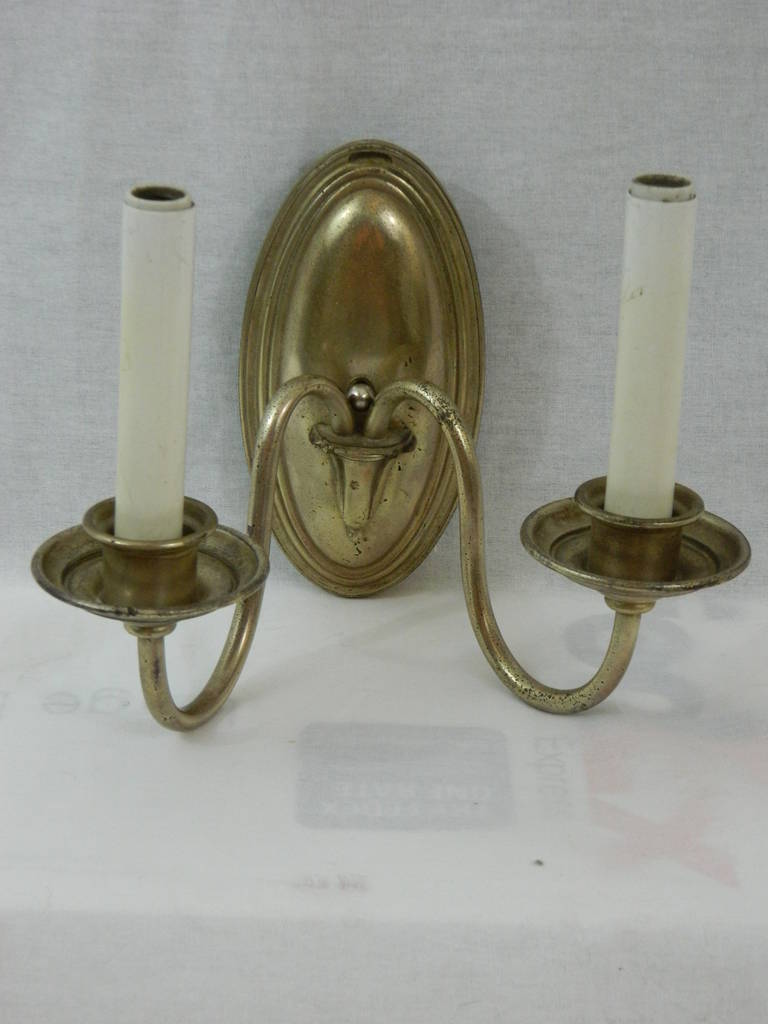 Pair of silver two light sconces, circa 1920s.