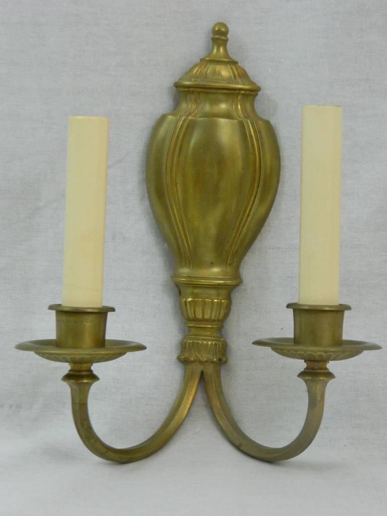 Circa 1910s Pair of Louis XVI Style Gilt Bronze Two Light Wall Sconces by Sterling Bronze Co, New York