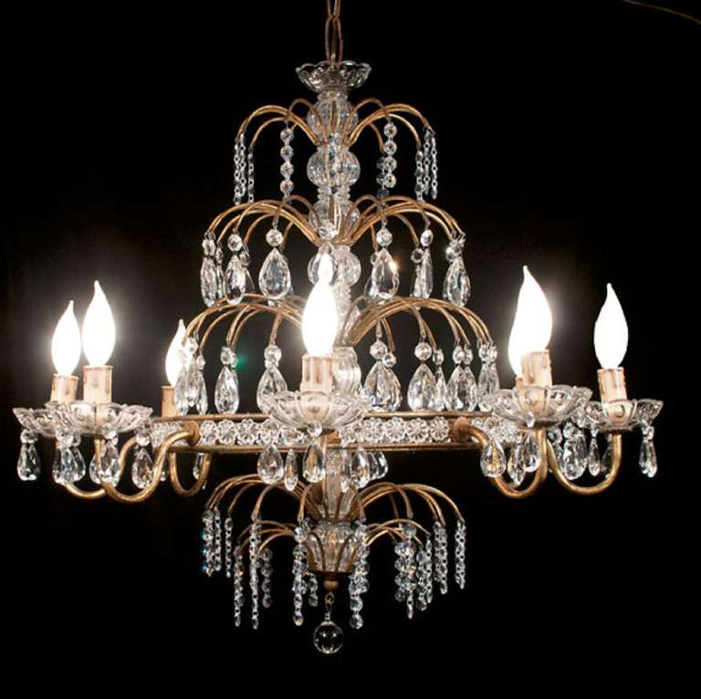 Early 20th Century Eight Branch Venetian Style Brass and Crystal Chandelier with Cut Crystal Prisms