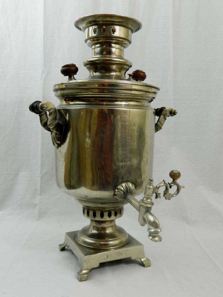 Fabulous and large Circa 1825 Silver Plate and Wood Russian Samovar, dated 1825.  Hallmarks in front and back.  It should be used as a decorative piece not a usable one