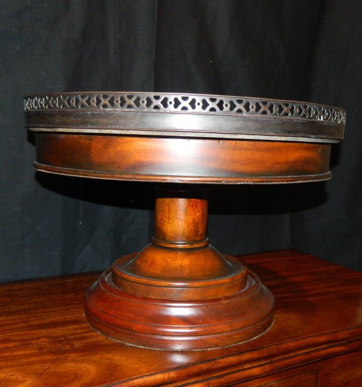 A Mahogany Serviteur or Plateau with Carved Shaft and Marble Galleried Round Top.  Interior Could be Used as a Secret Compartment