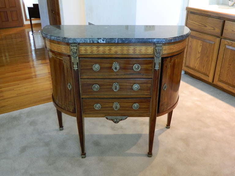 French marquetry commode or dessert console with original St. Anne marble top and bronze ormolu, circa 1800s.