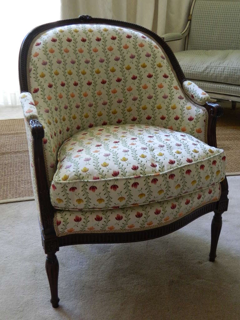 19th Century French Oak Neoclassical Style Tub Chair or Bergere, raised on tapering fluted legs and a Down Cushion seat