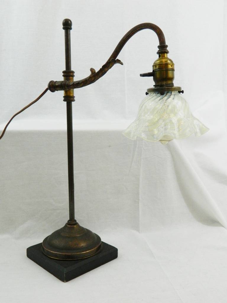 Adjustable student lamp with period opalescent shade attributed to Caldwell, circa 1900.