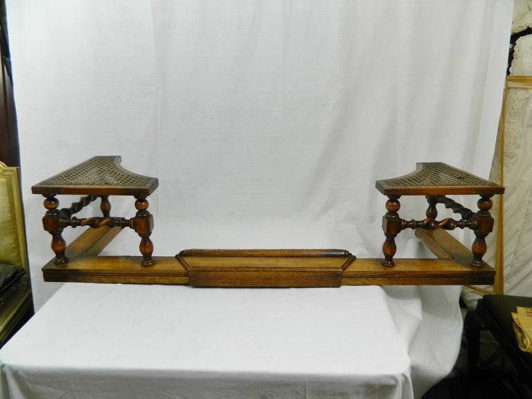 19th Century French Adjustable Wood Club Fender with Barley Twist Supporting Posts and Cane Seats.
Dimensions:  58.75
