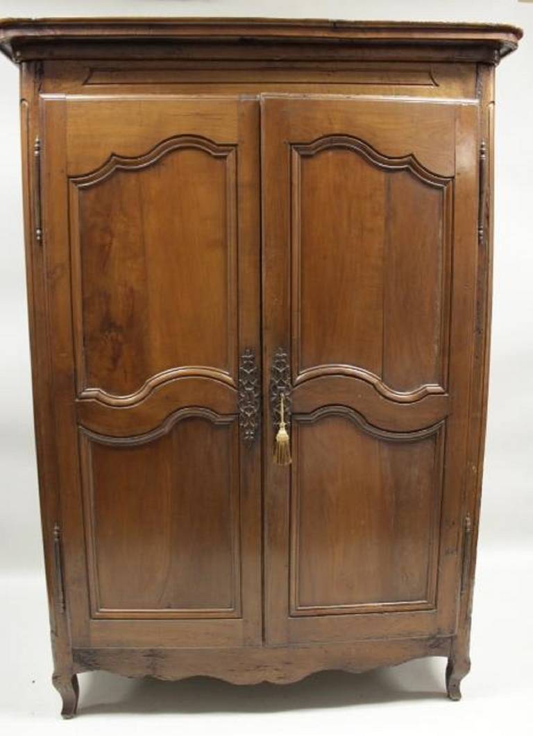 18th century French walnut armoire, peg construction, newer interior shelves.