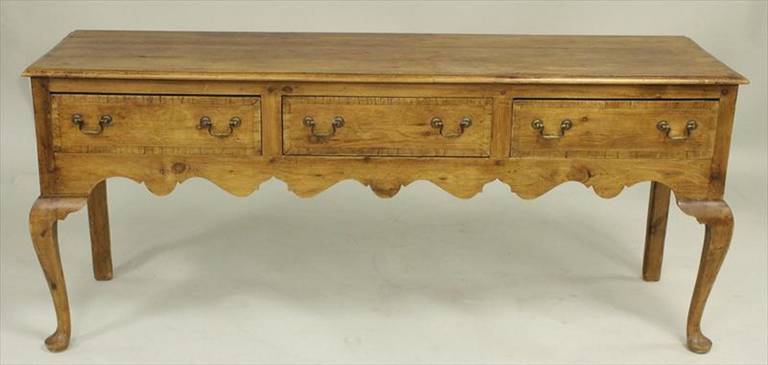 Early 20th century Queen Anne style English pine dresser base or server, shaped apron, drawer fronts with crossbanding.