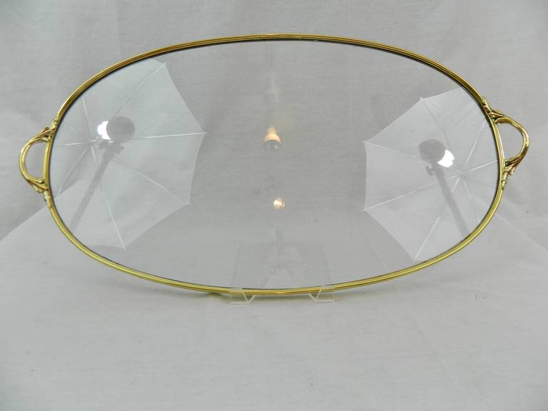 19th century French polished brass and glass oval tray with handles.