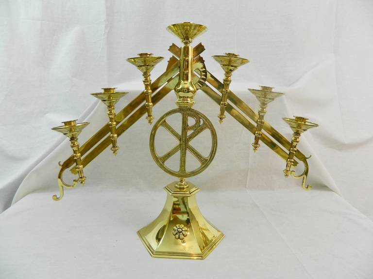 19th century polished brass pair of adjustable seven-arm menorah or candlesticks.