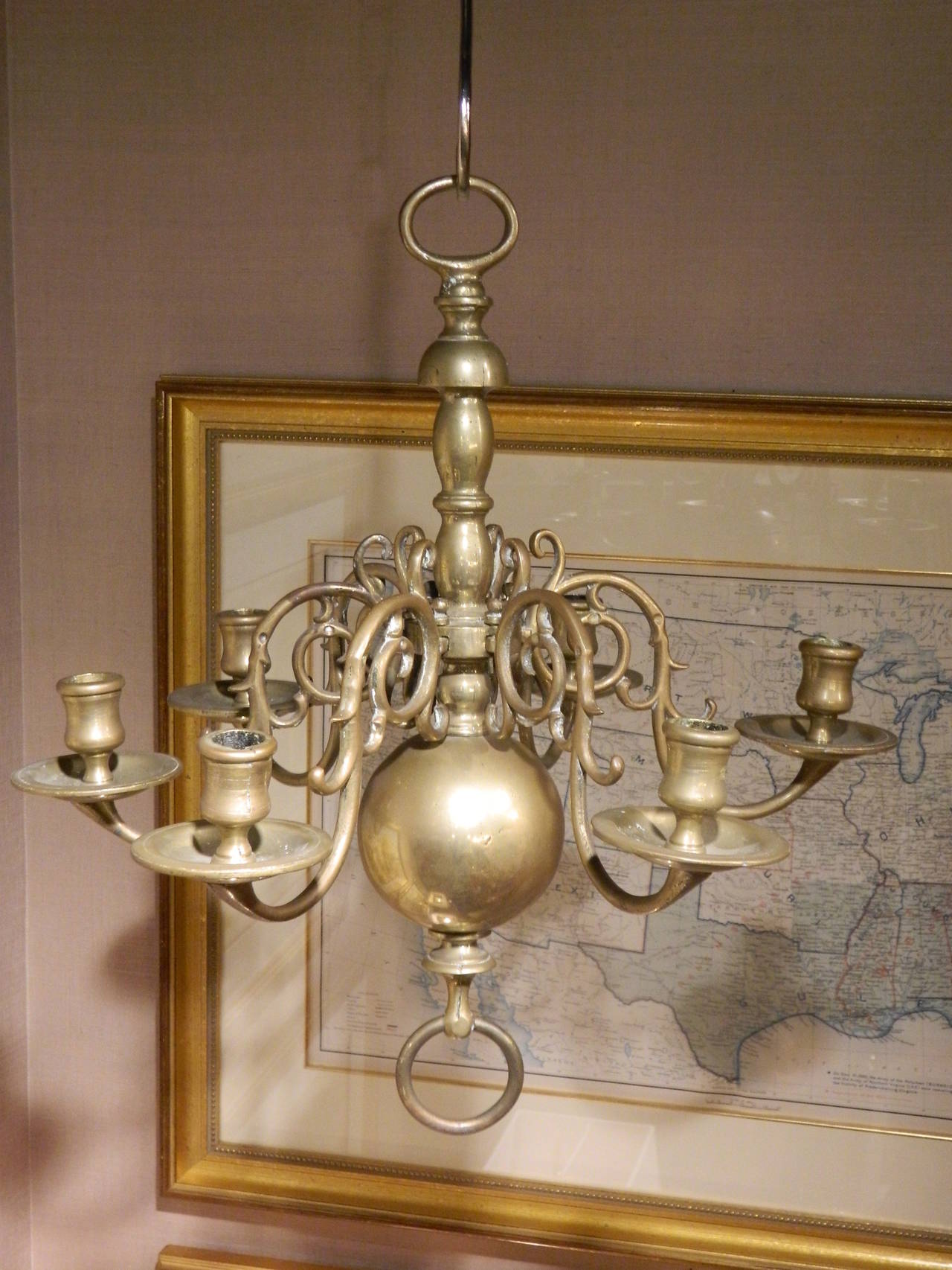 Early 19th Century Dutch Style Brass Six Light Pegged Chandelier.  This chandelier can not be electrified as it is too small for all the wires.