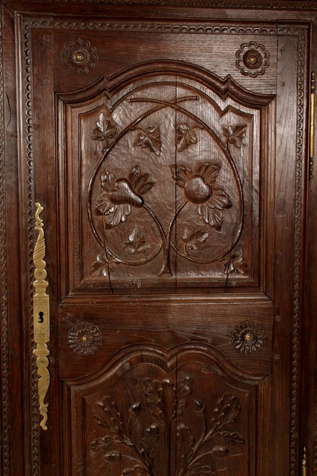 A French Oak Bonnetiere with Carved Door, Early 19th Century 2