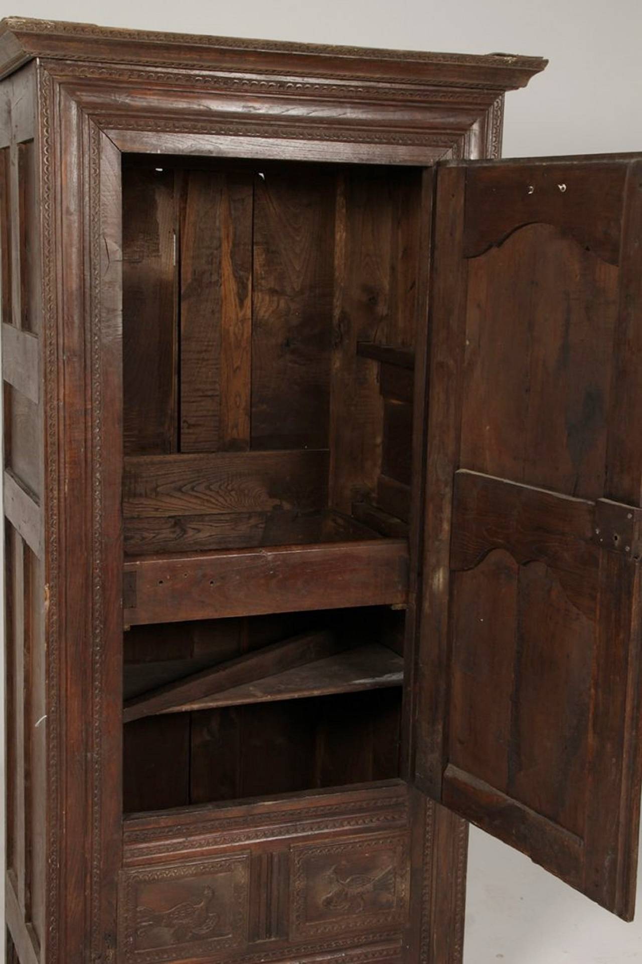 A French Oak Bonnetiere with Carved Door, Early 19th Century 4