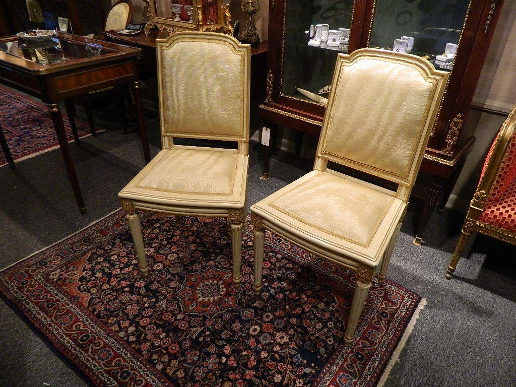 Set of six Louis XVI style painted and gilded side chairs, Early 20th century.  
Chairs need to be re-upholstered.  Water stains not shown on photos