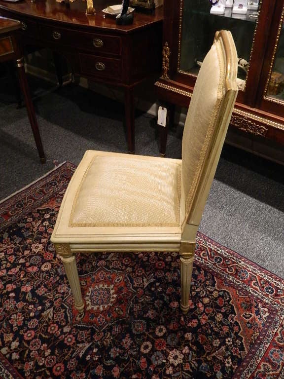 French Set of Six Louis XVI Style Painted and Gilded Side Chairs, Early 20th Century