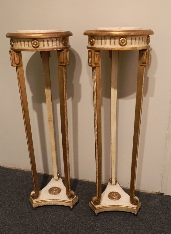 Pair of Louis XIV Style Pedestal Stands, Painted and Parcel-Gilt, the Circular Top Supported by Three Legs, Raised on Block Bases, and Marble Tops