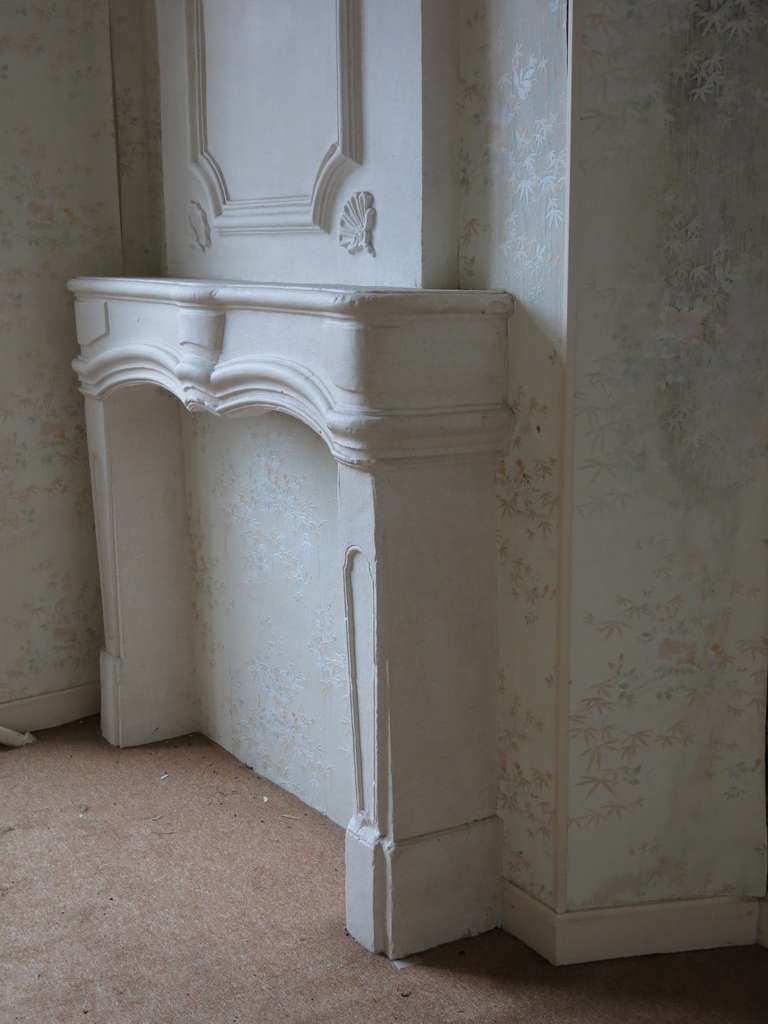 Limestone Louis XIV Period 17th Century Bombee Fireplace with Trumeau Original France For Sale