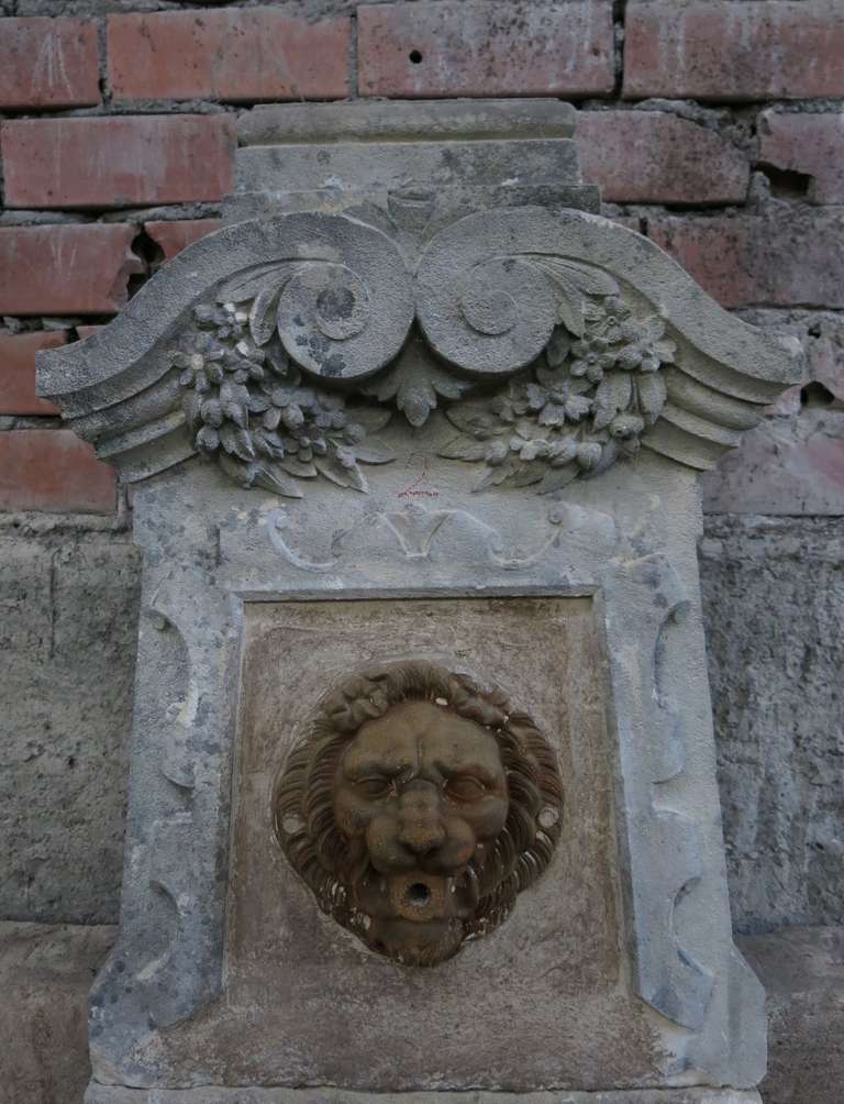 Hand-Crafted French Antique Large Wall Fountain Lion Head Limestone and Iron 19thC France