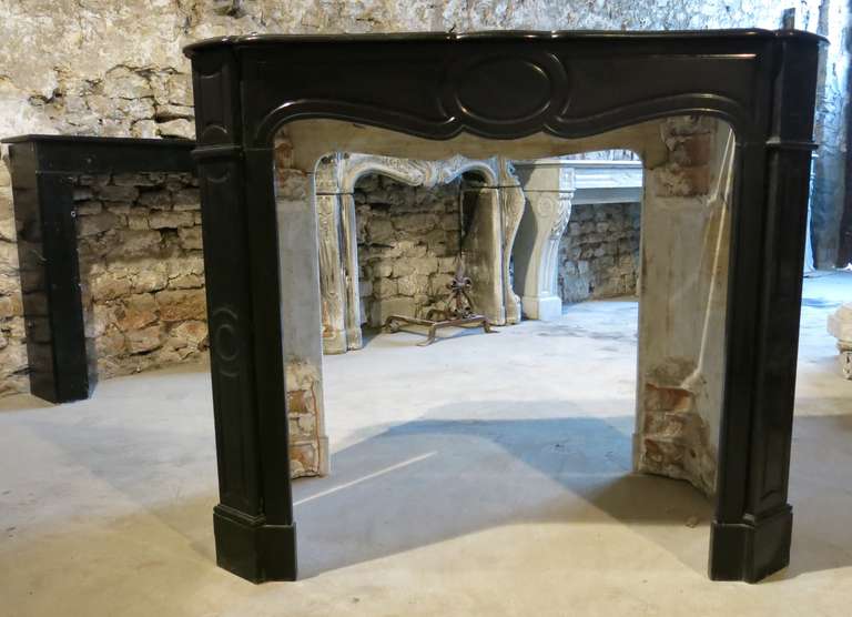 Rare black marble (very fine) fireplace Louis XV style 19th century from Paris-France.
Hand carved from that period.
Great quality of marble and style. Restored and ready for installation.
Firebox measures: Width 33.5 inches x high 33.9