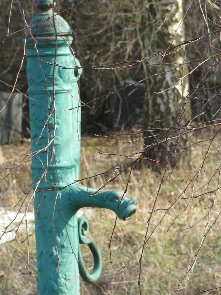 Hand-Crafted French Village Limestone Water Fountain with Iron Water Pump, France, circa 1800 For Sale