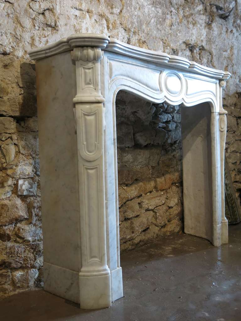 A French Louis XV-Pompadour style fireplace in white marble with blue lines.
From Paris France, handcrafted in the 19th century.
It has been restored and its ready for installation.

The 