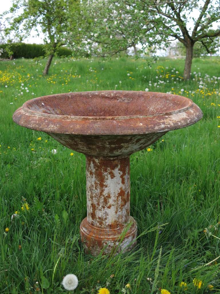 A rare French Louis XIV style birds-bath center fountain handmade in iron from France, circa 1830s.
It was used as a center round fountain (base 33cm x 33cm).
Solid Iron, great quality of Art work. Original patina.
        
    