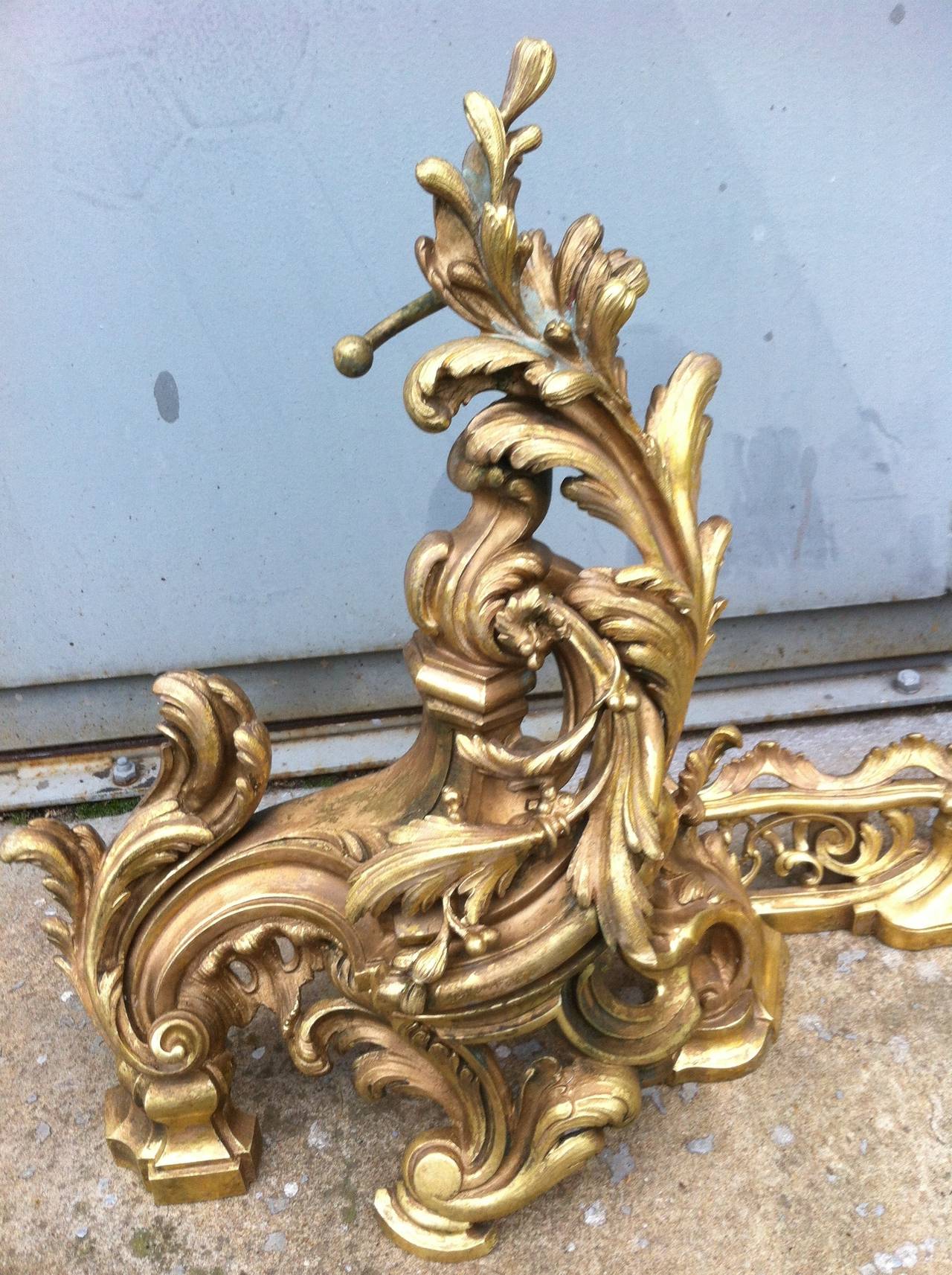 Rare and unique French Parisian antique andirons Regency style, handcrafted in pure solid bronze, early 1800s from Paris in France.

Beautiful quality of French Art work from that period, in excellent condition.
The high quality of this bronze is