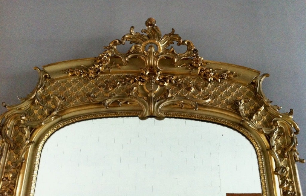 Castle mirror Regency style in gold finition "nid d abeilles".