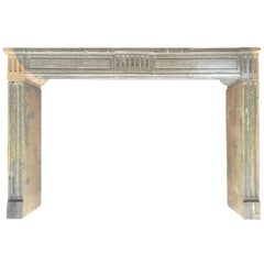 French Louis XVI Period Hand Carved Fireplace in Stone, circa 1790s, France