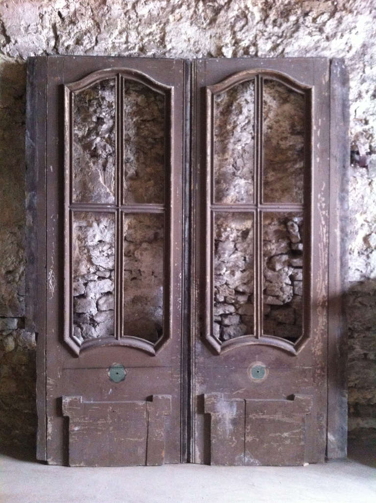 An original French Louis XIV period double doors handcrafted in French oak, circa 1700s. From Paris, France.

Great thickness of sculptures handcrafted in pure French antique oak.
Beautiful quality of work.

More info's on demand.
 