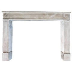 French Louis XVI Period Fireplace "Marguerites" in Limestone, circa 1790, France