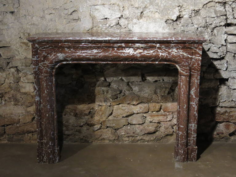 A French Louis XIV style handcrafted fireplace in a rare and great quality of a 