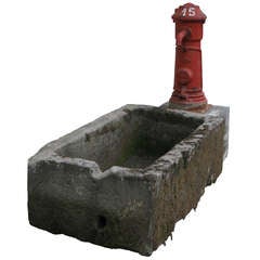 Fountain with Hydrant from France in stone and solid Iron, stone basin 18thC.'. 8