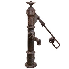 Antique Village water pump in iron from France.