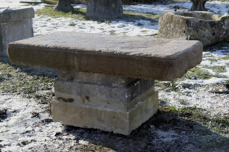 Large and rare garden table in limestone from France, composed of French antique limestone elements from the 19th century.
In 2 sections, pedestal very interesting. 