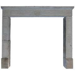 French Louis XVI Style Fireplace Hand Carved Limestone from France, 19th Century
