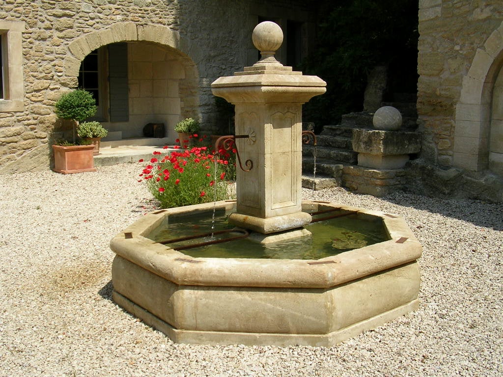 A French Louis XIV style surround fountain handcrafted in limestone from South of France, Provence (Riviera coast), France.

Beautiful basin with elegant presentation, with iron Art work.
Two sprouts for water fall.

We have many different