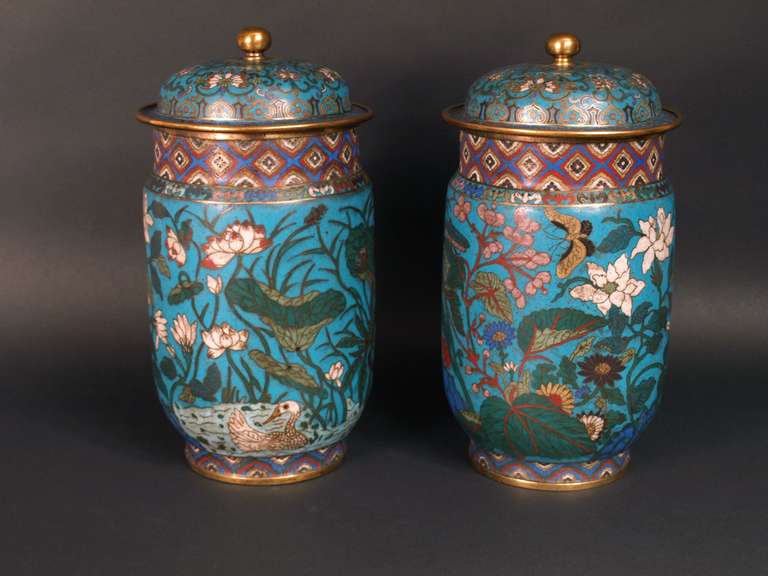 Pair of cloisonné Zhuang Guan vases, China, 18th Century. The Chinese name of this covered vase type is Zhuang Guan. The earliest mention of this shape is in the Shuowen, a kind of dictionary written in the 2nd Century. This shape has been used