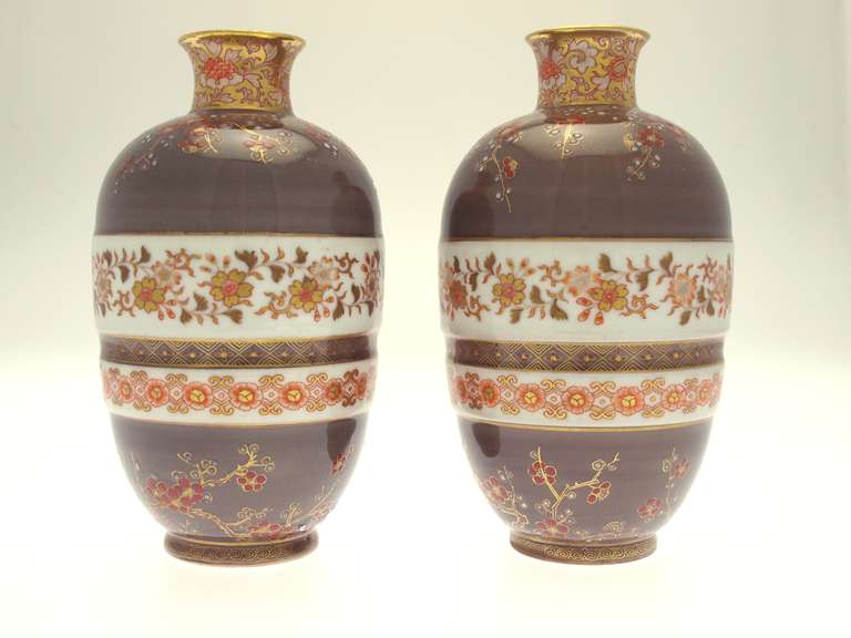 Japan, pair of Koransha vases circa 1900. an unusual Imari style pair of vases hand decorated with different flowers. 
Signed with the Koransha orchid mark and an old tag.
Height is 15cm diameter is 8cm.
Japan , Meiji Period circa 1900, signed