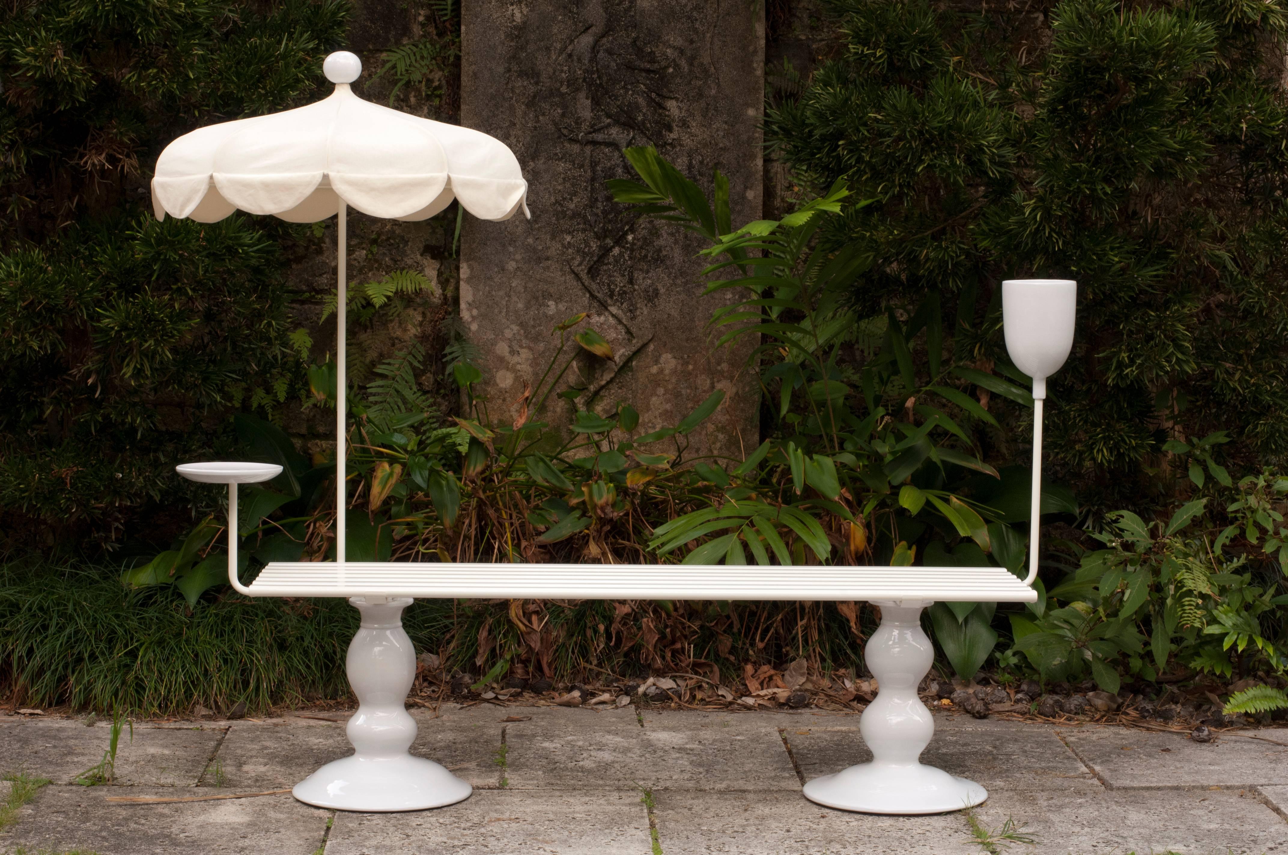 This playful, whimsical outdoor bench was created in 2012 by French designer Sam Baron for the Fairchild Tropical Botanic Garden's inaugural exhibition of Design at Fairchild: Sitting Naturally. 

Made of white lacquered wood strips, metal and