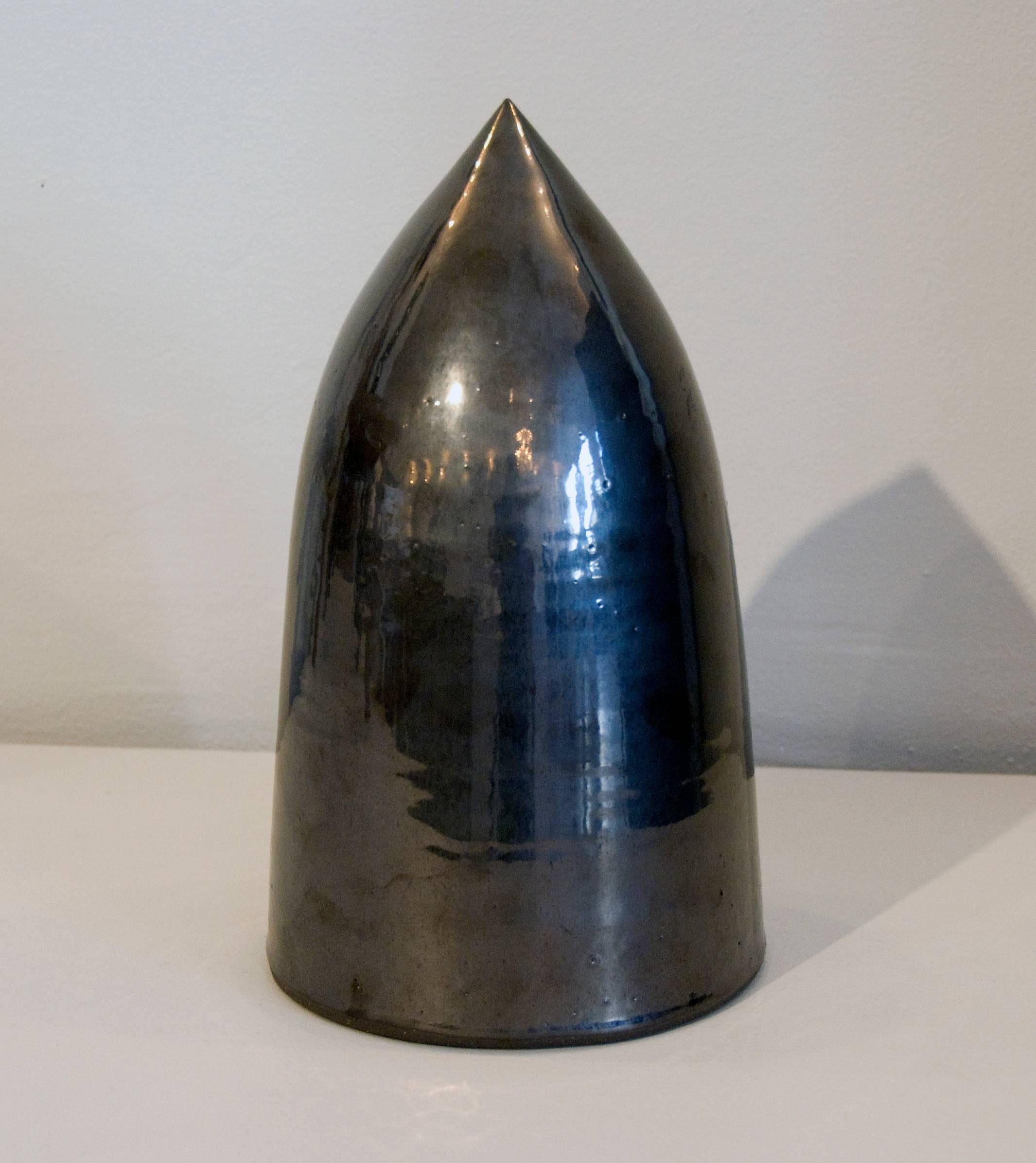 This graphite sculpture is made from high fired stoneware with graphite glaze in 2011 is the work of sculptor James Salaiz.

James is a sculptor and ceramicist based in New York City. His first experience with clay was as a young child in San