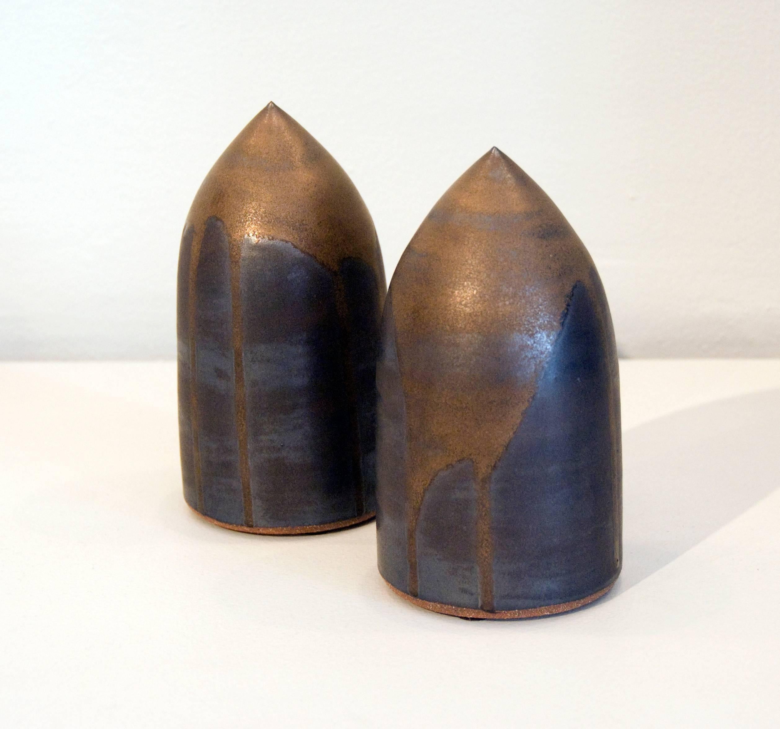 This gold and graphite sculpture made of high fire stoneware with glaze and gold over-pour from 2011 is the work of sculptor James Salaiz.

James Salaiz is a sculptor and ceramicist based in New York City. His first experience with clay was as a