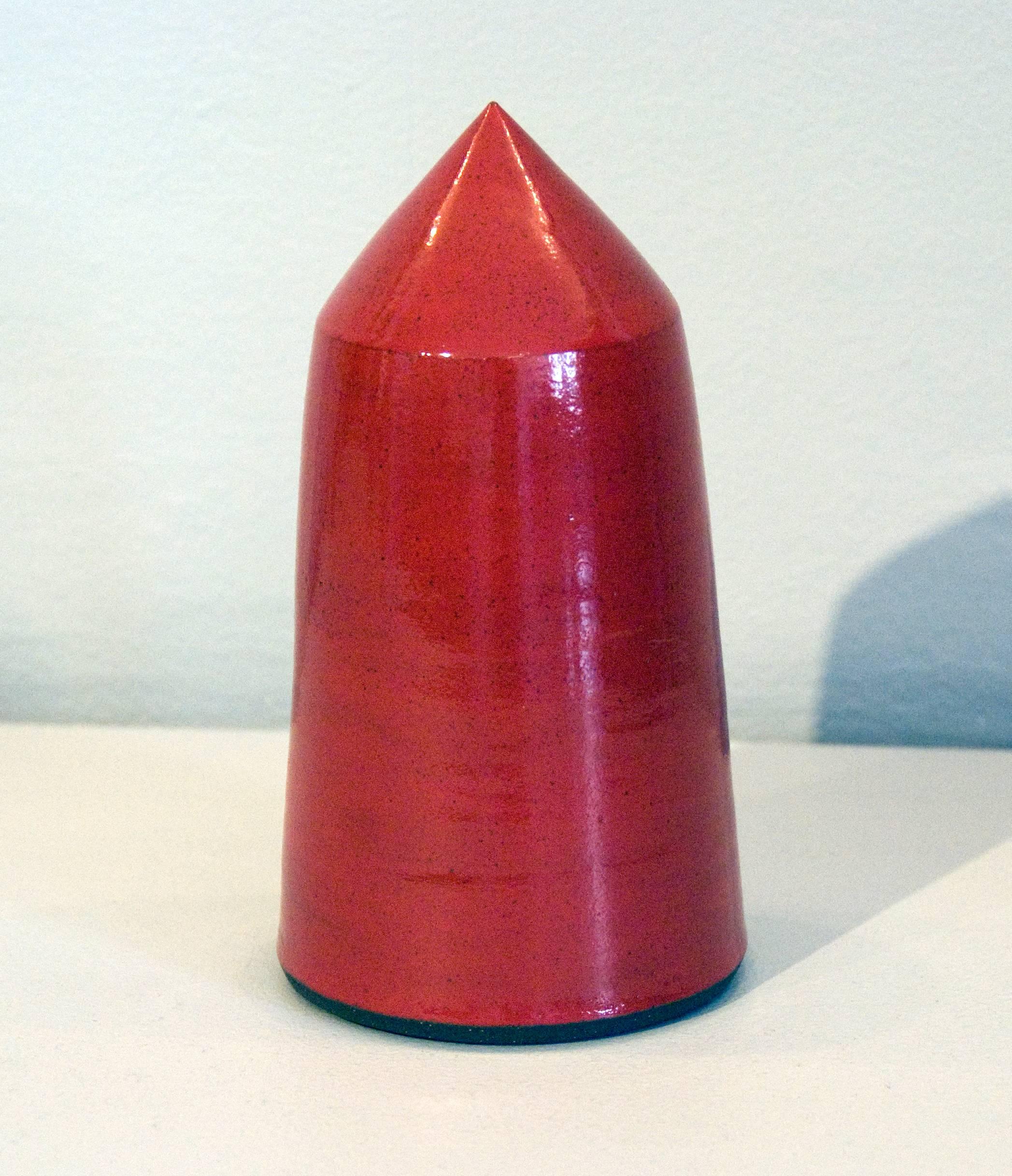 This red sculpture made of high fire stoneware with scarlet glaze from 2011 is the work of sculptor James Salaiz.

James Salaiz is a sculptor and ceramicist based in New York City. His first experience with clay was as a young child in San Antonio,
