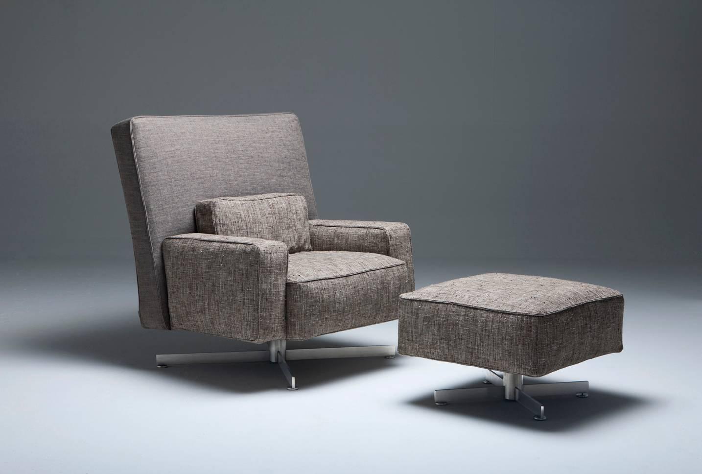 Swivel armchair with rocking mechanisms. Brushed stainless steel base with adjustable feet. Polyurethane foams and goose feather padding. Fabric removable and leather fixed cover. It is possible to order the armchair with back and seat made in