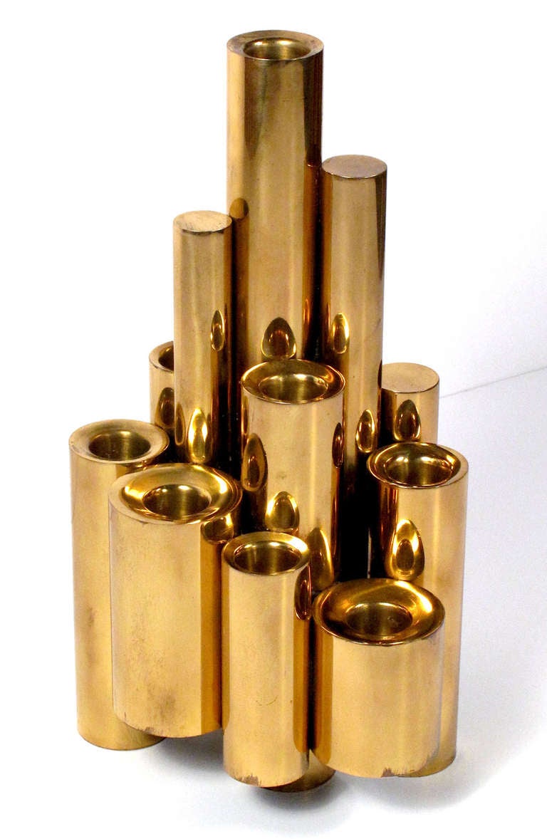 A spectacular brass candleholder by Gio Ponti. Holds 8 candles.