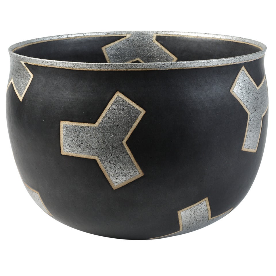 An Important Black Stoneware Cup with Silver Decoration